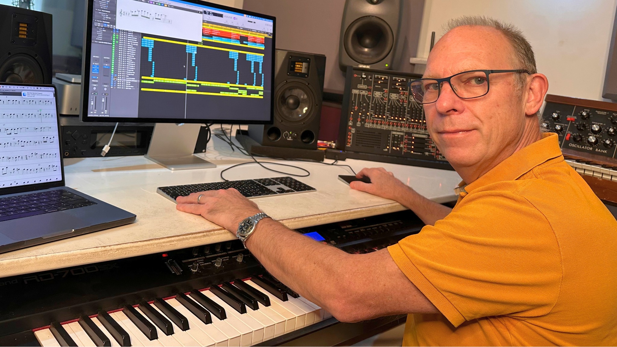 Andy Whitmore producing music at the Greystoke Studio desk